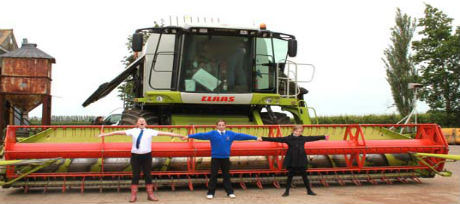 Barton School pupils in front of Combine Harvester